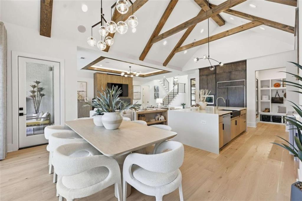 4632 A Shirley Road Gainesville, GA 30506 - Photo 19 of 72 a view of a dining room with furniture and wooden floor