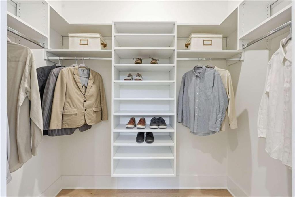 4632 A Shirley Road Gainesville, GA 30506 - Photo 23 of 72 a view of walk in closet with clothes and shoes
