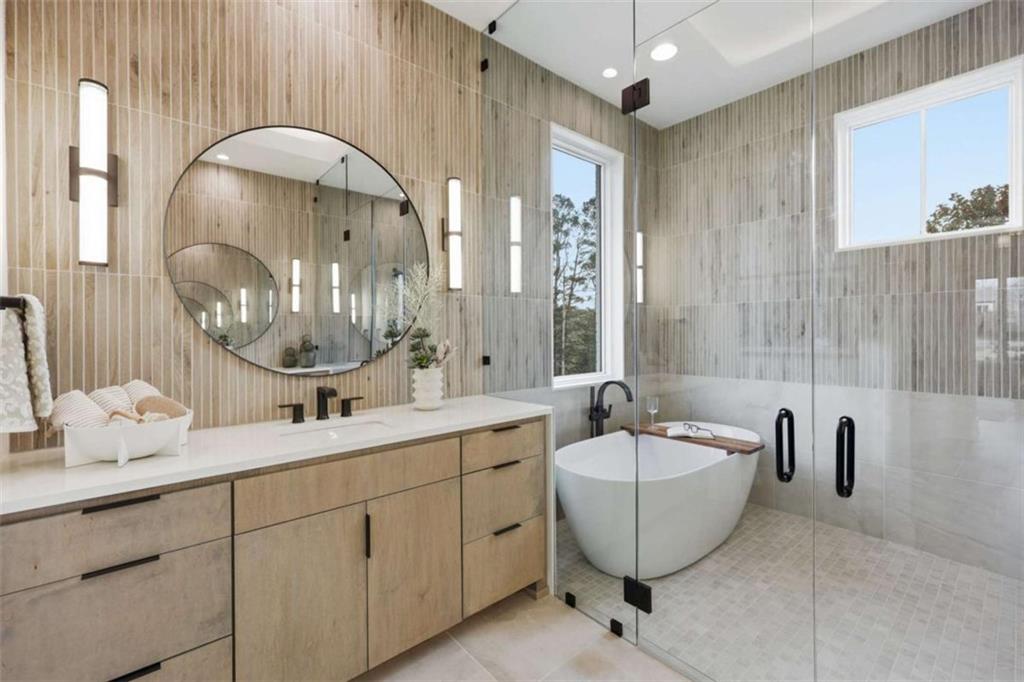 4632 A Shirley Road Gainesville, GA 30506 - Photo 30 of 72 a spacious bathroom with a sink and a mirror