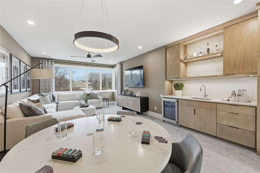 4632 A Shirley Road Gainesville, GA 30506 - Photo 41 of 72 a living room with furniture and kitchen view
