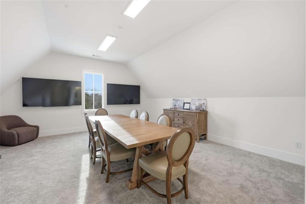 4632 A Shirley Road Gainesville, GA 30506 - Photo 50 of 72 a view of a dining room with furniture and wooden floor
