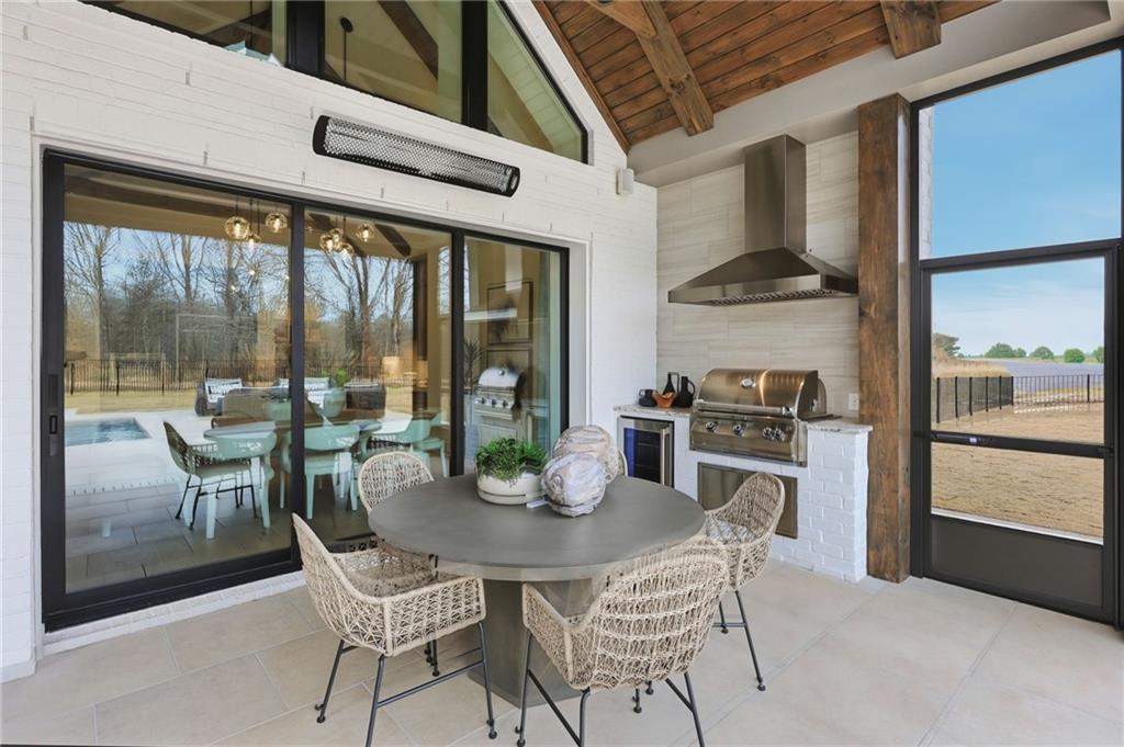 4632 A Shirley Road Gainesville, GA 30506 - Photo 54 of 72 a view of a dining room with furniture window and outside view