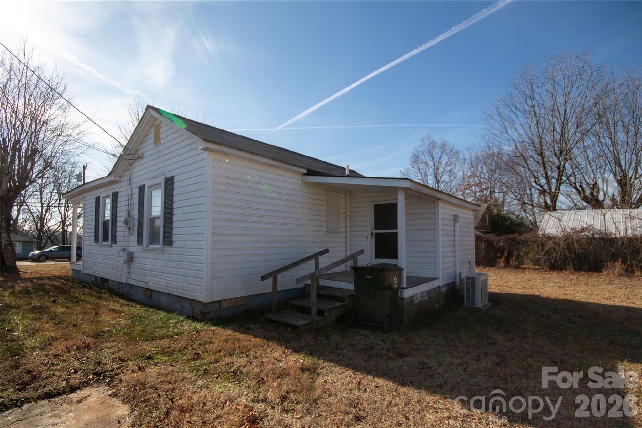 231 Cedar Valley Road Hudson, NC 28638 - Photo 33 of 33 a backyard of a house with table and chairs