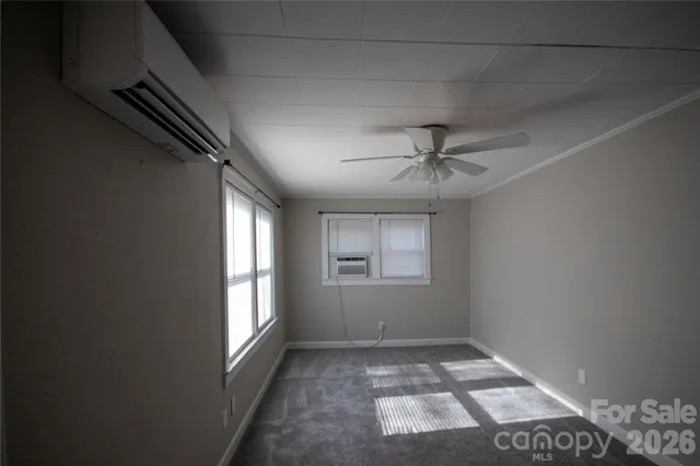 an empty room with windows