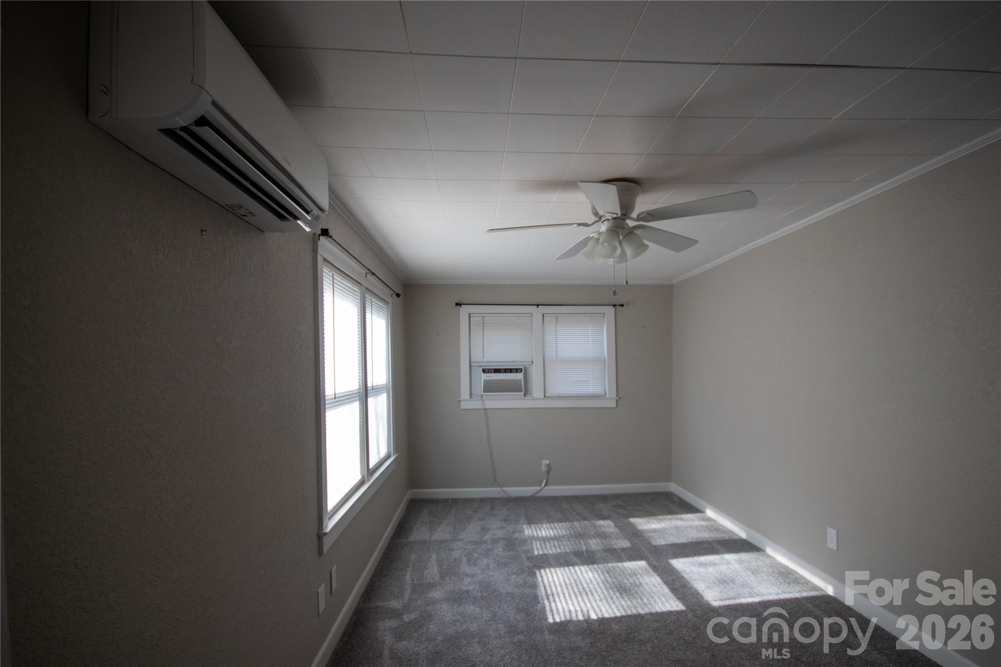 231 Cedar Valley Road Hudson, NC 28638 - Photo 6 of 33 an empty room with windows