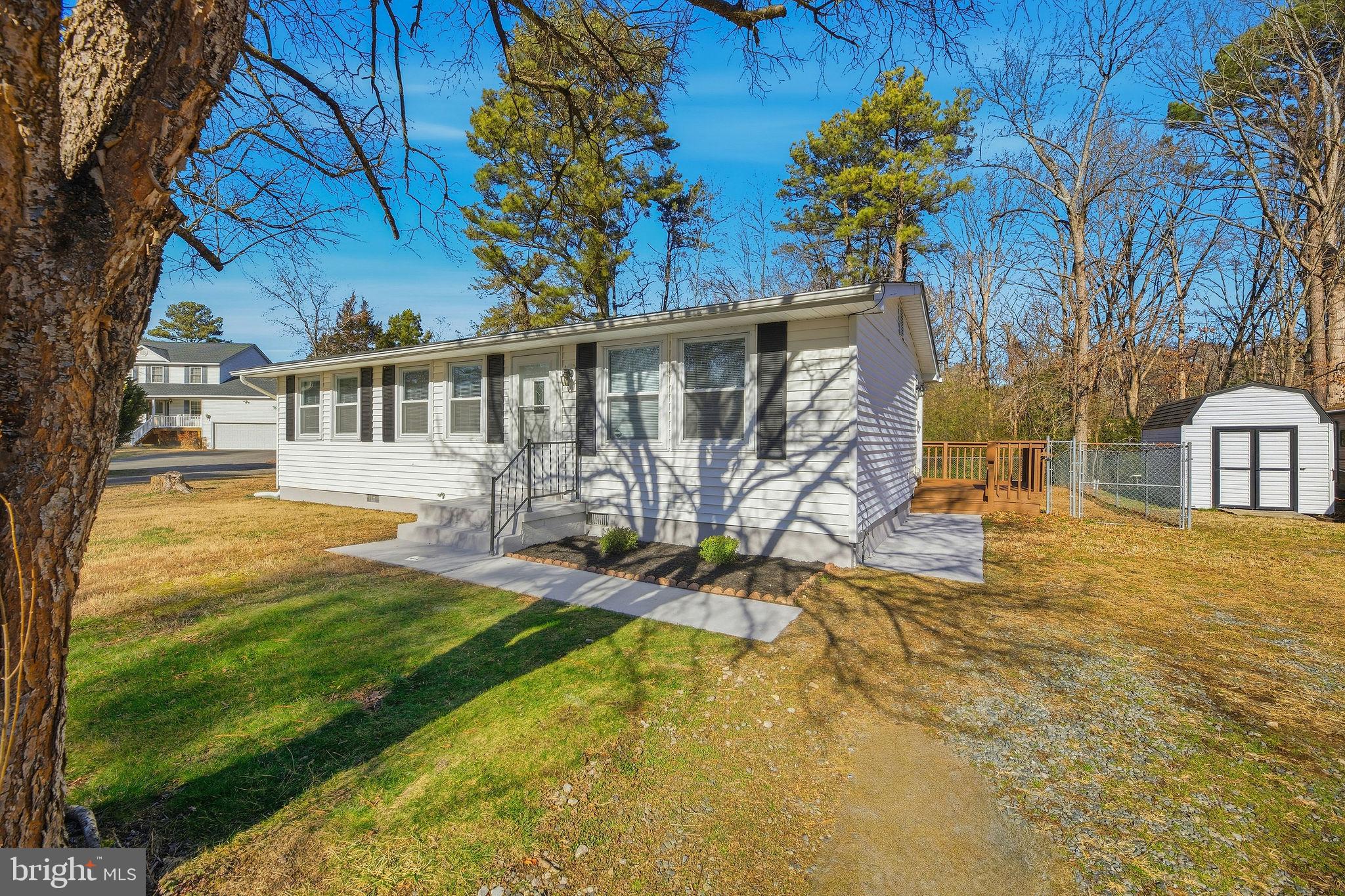 13108 Joy Road Lusby, MD 20657 - Photo 21 of 40 a view of a house with pool and sitting area
