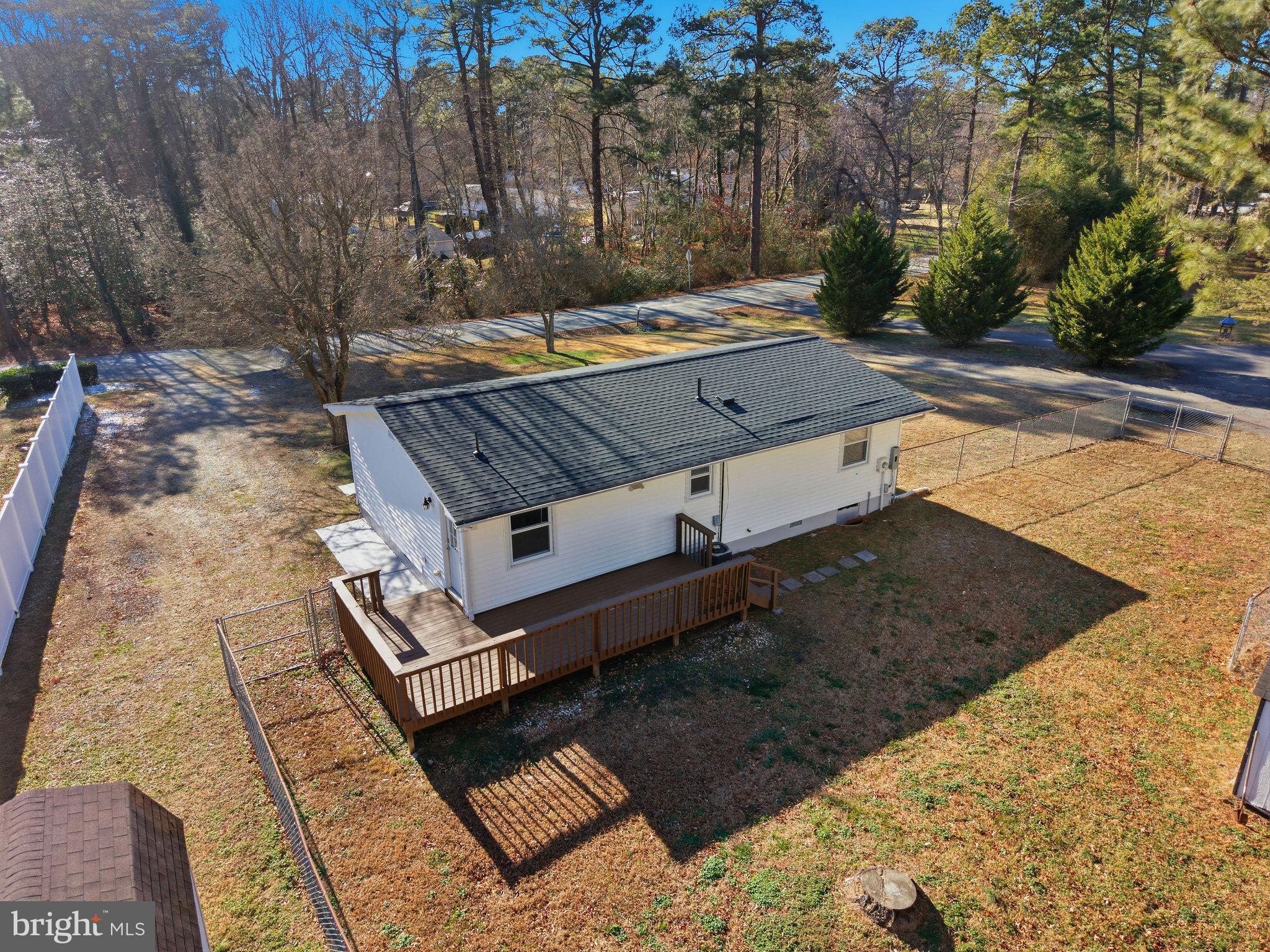 13108 Joy Road Lusby, MD 20657 - Photo 25 of 40 a view of a backyard with sitting area