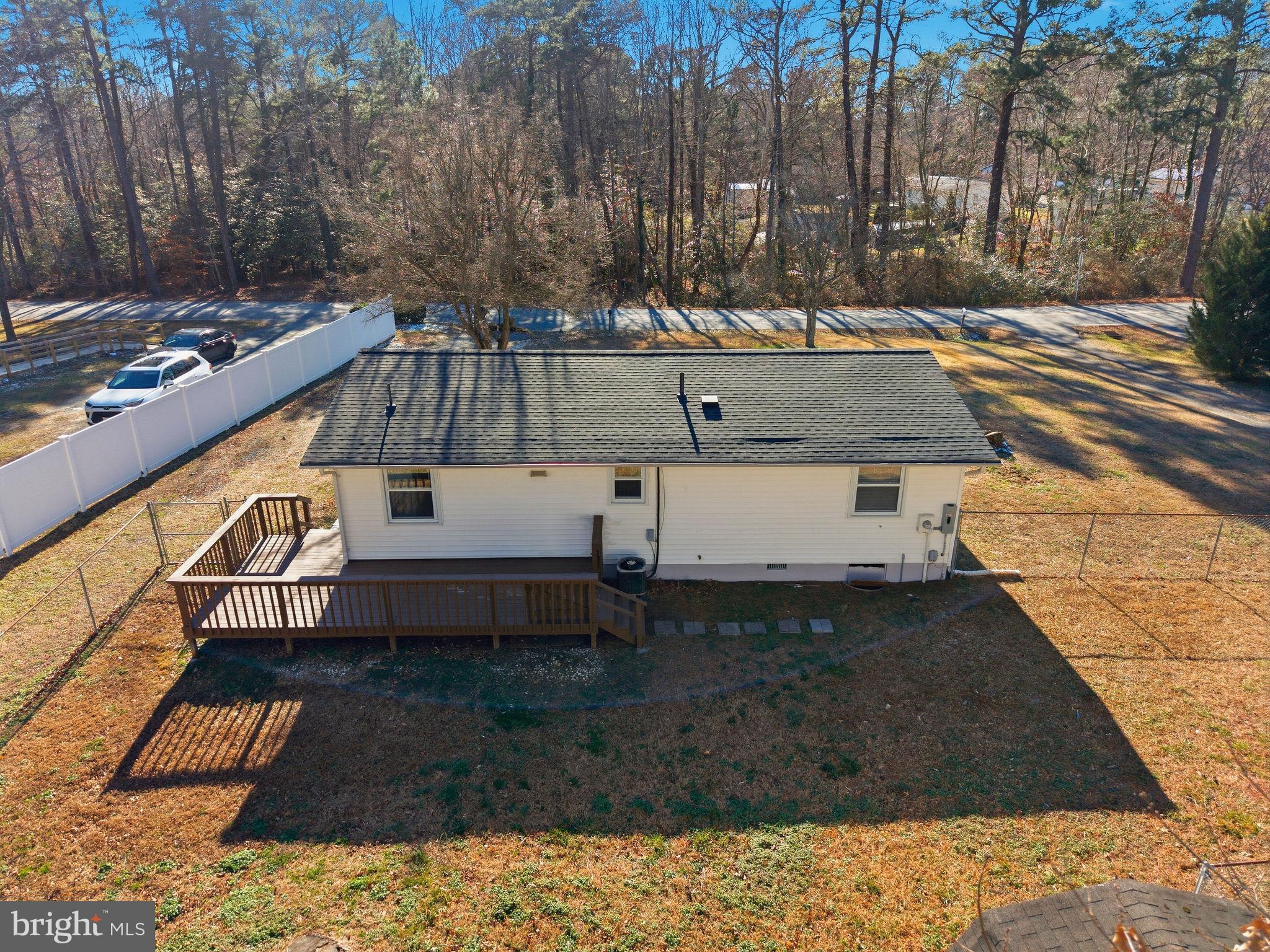 13108 Joy Road Lusby, MD 20657 - Photo 26 of 40 a view of a backyard with sitting area