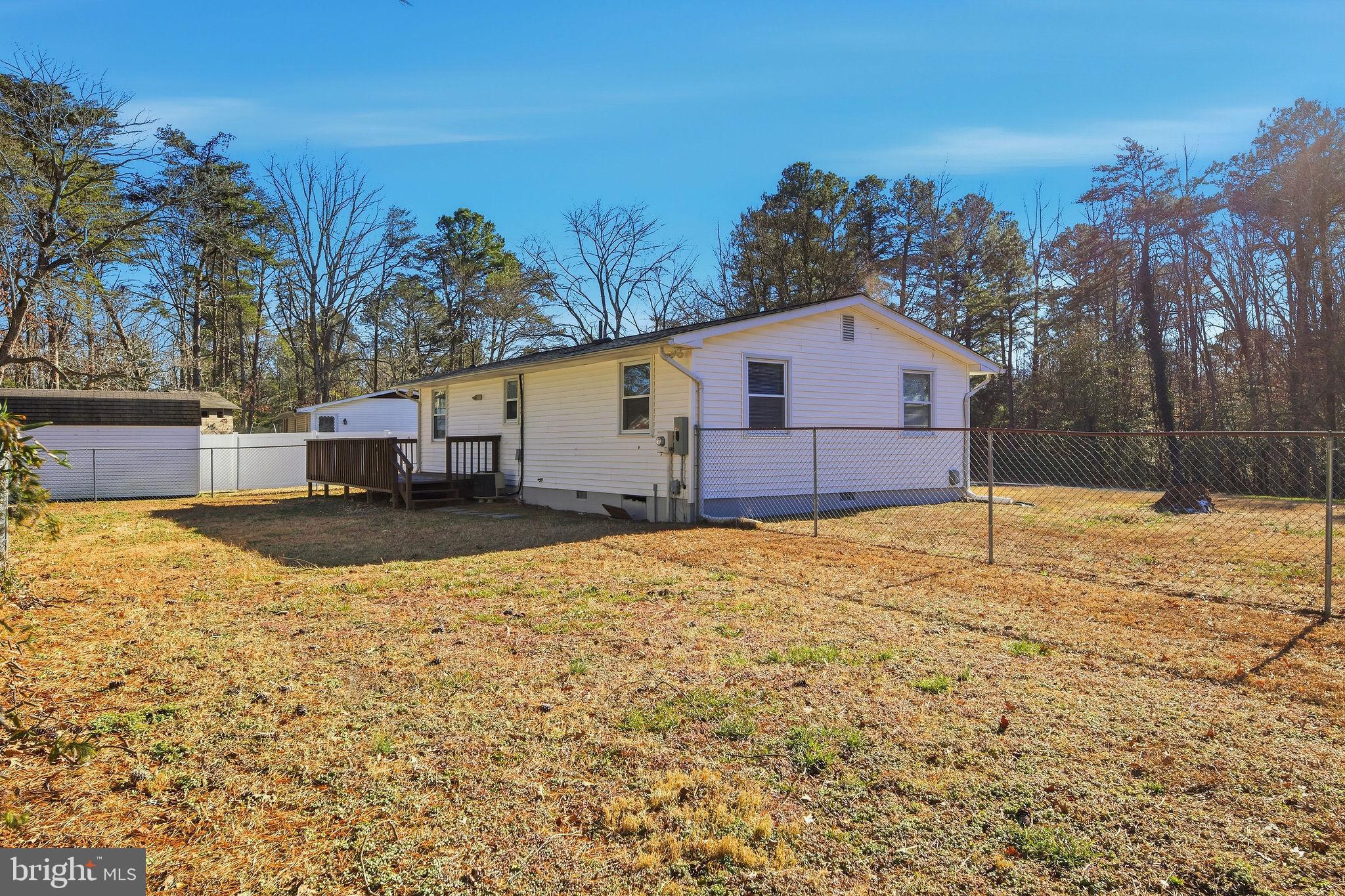 13108 Joy Road Lusby, MD 20657 - Photo 28 of 40 a view of a house with snow on the yard