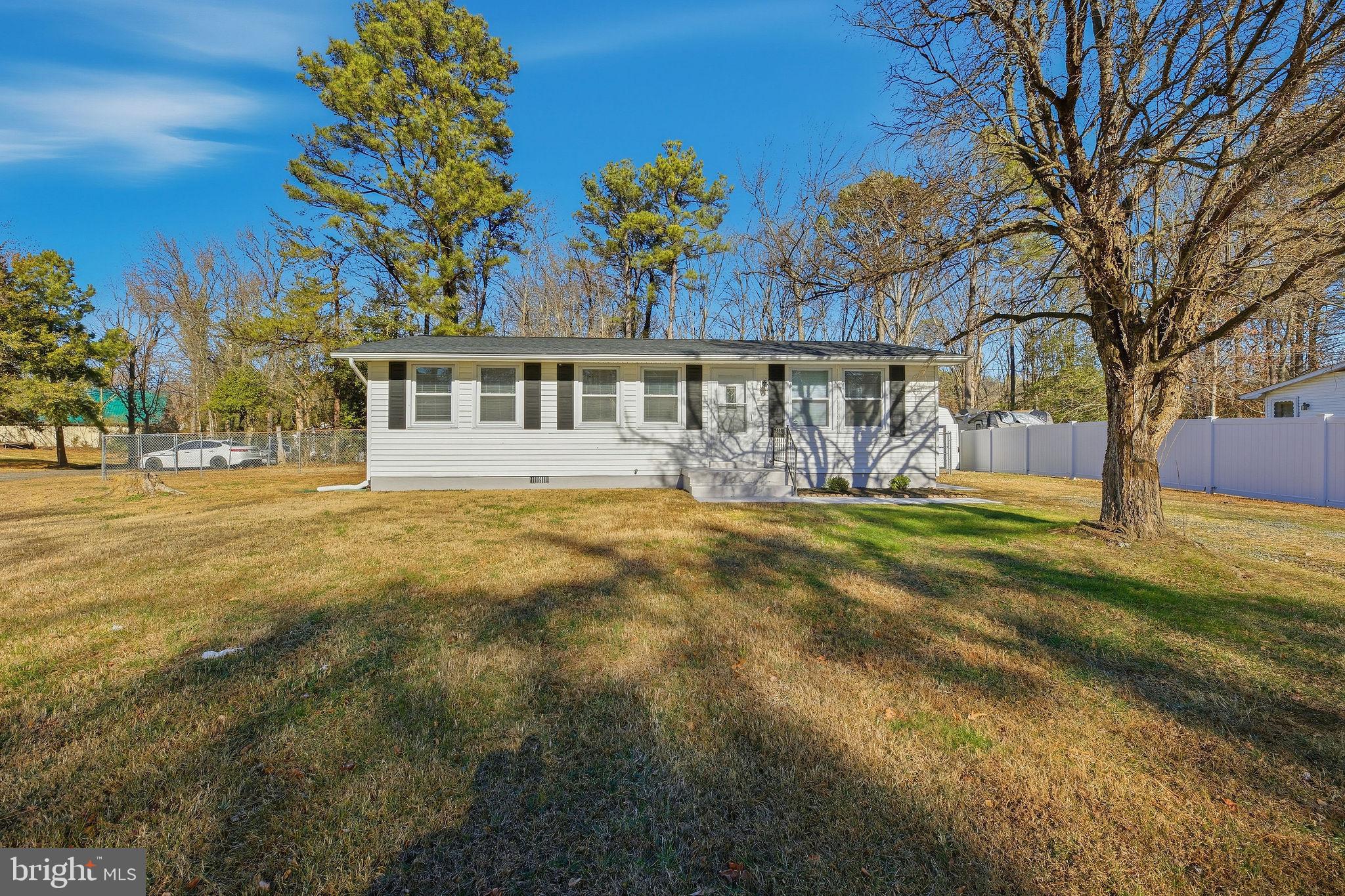 13108 Joy Road Lusby, MD 20657 - Photo 37 of 40 a view of house with yard in front of it