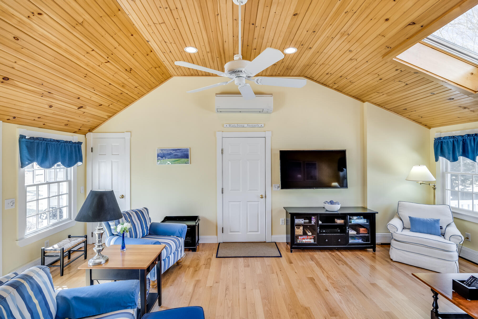 30 Beach Road Orleans, MA 02653 - Photo 12 of 76 a living room with furniture and a flat screen tv