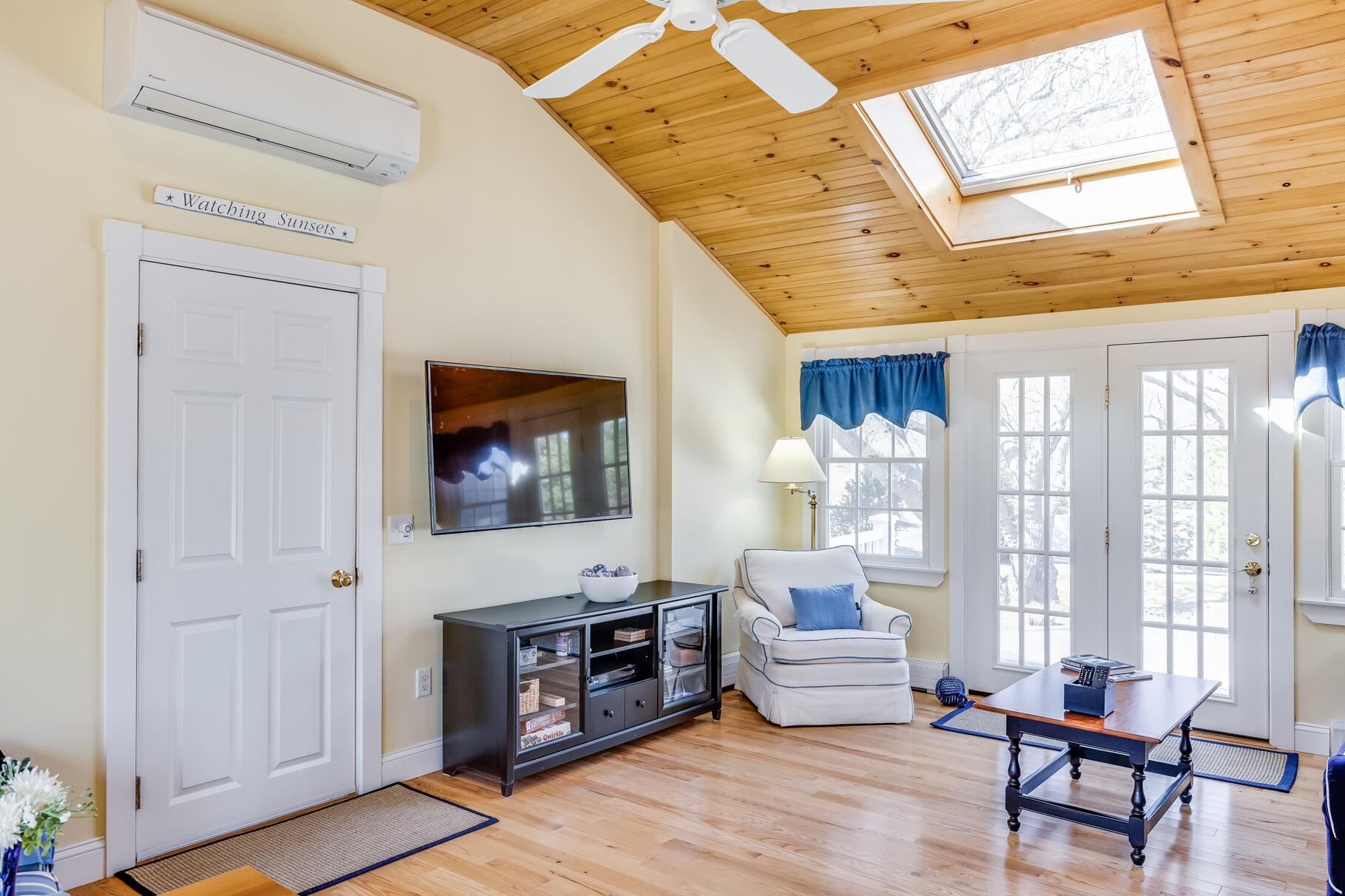 30 Beach Road Orleans, MA 02653 - Photo 14 of 76 a living room with furniture and a flat screen tv