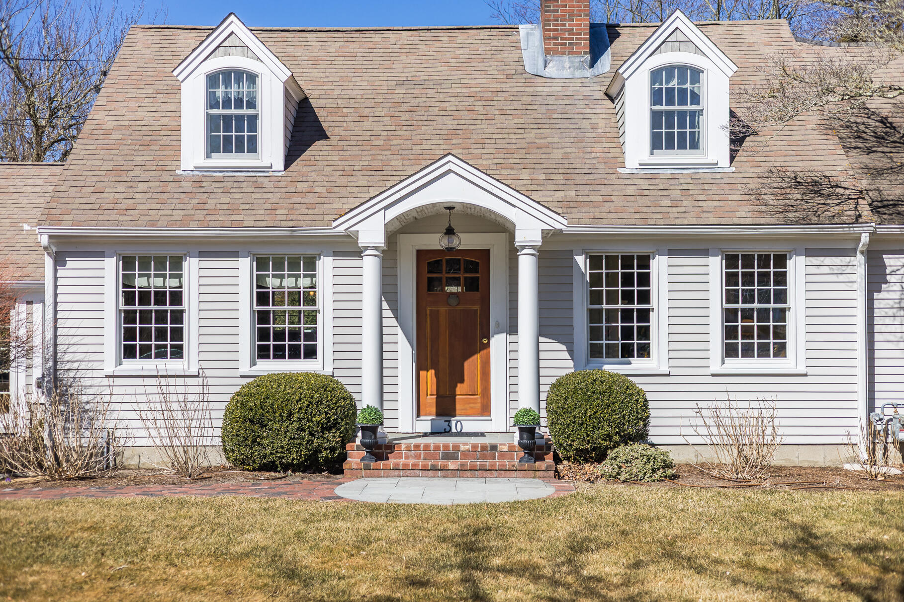30 Beach Road Orleans, MA 02653 - Photo 2 of 76 a front view of a house