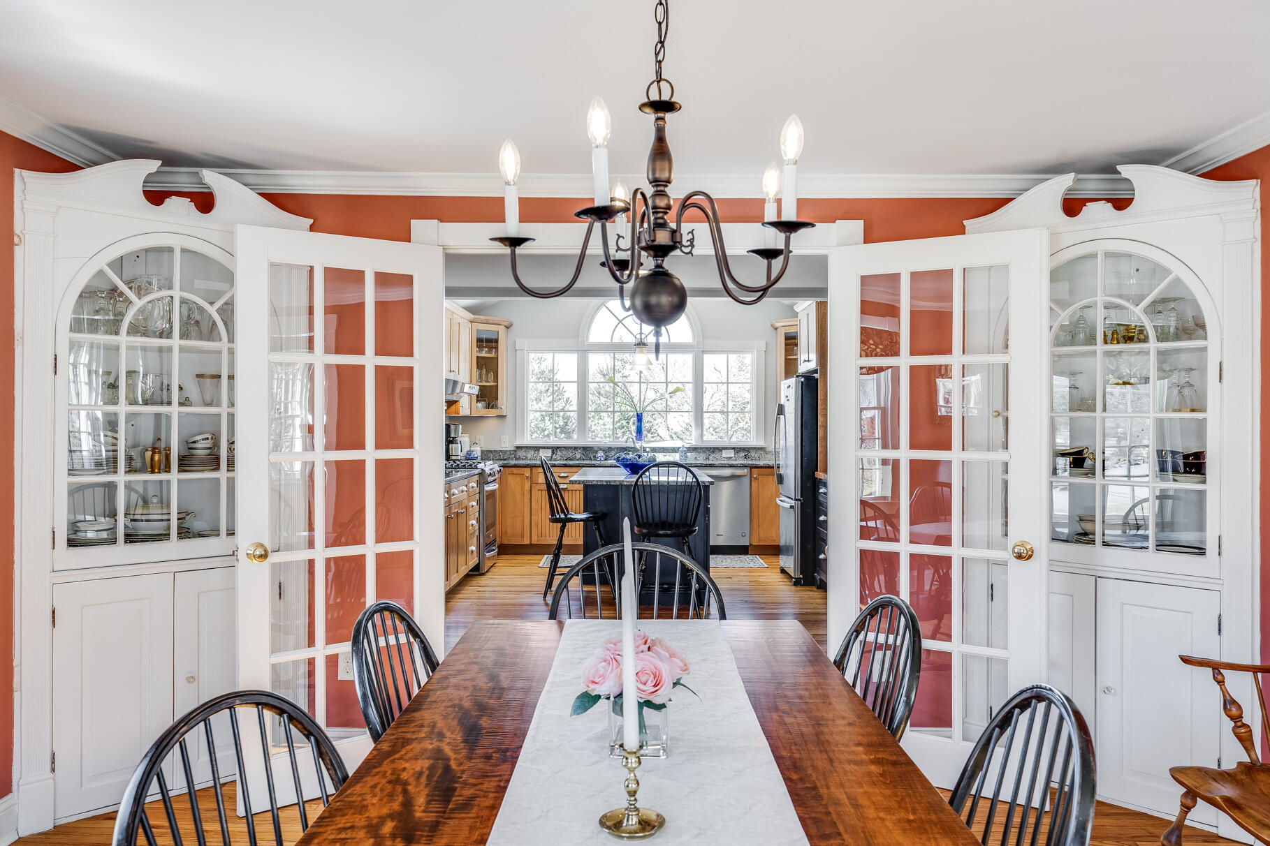 30 Beach Road Orleans, MA 02653 - Photo 22 of 76 a view of a dining room with furniture a chandelier and wooden floor