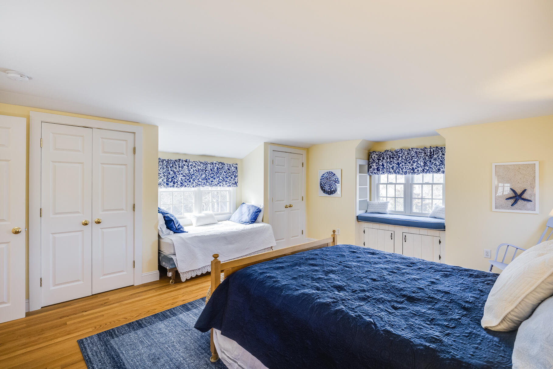 30 Beach Road Orleans, MA 02653 - Photo 49 of 76 a bedroom with a bed and a window