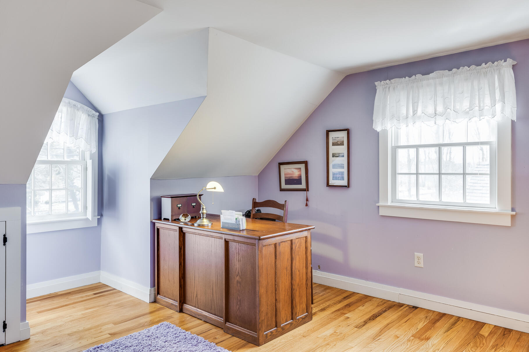 30 Beach Road Orleans, MA 02653 - Photo 53 of 76 a view of a kitchen with fridge and wooden floor