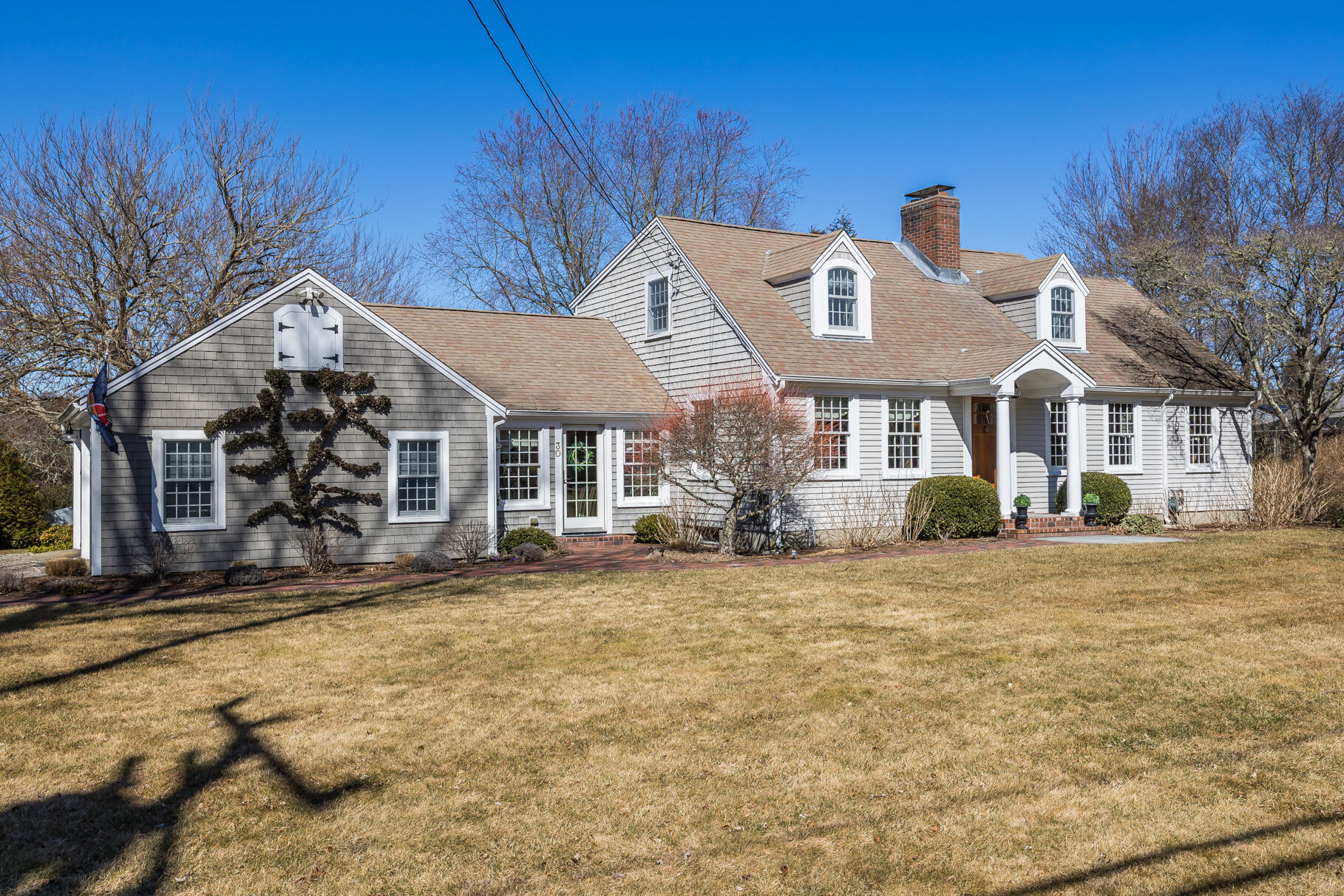 30 Beach Road Orleans, MA 02653 - Photo 56 of 76 a front view of a house with a yard