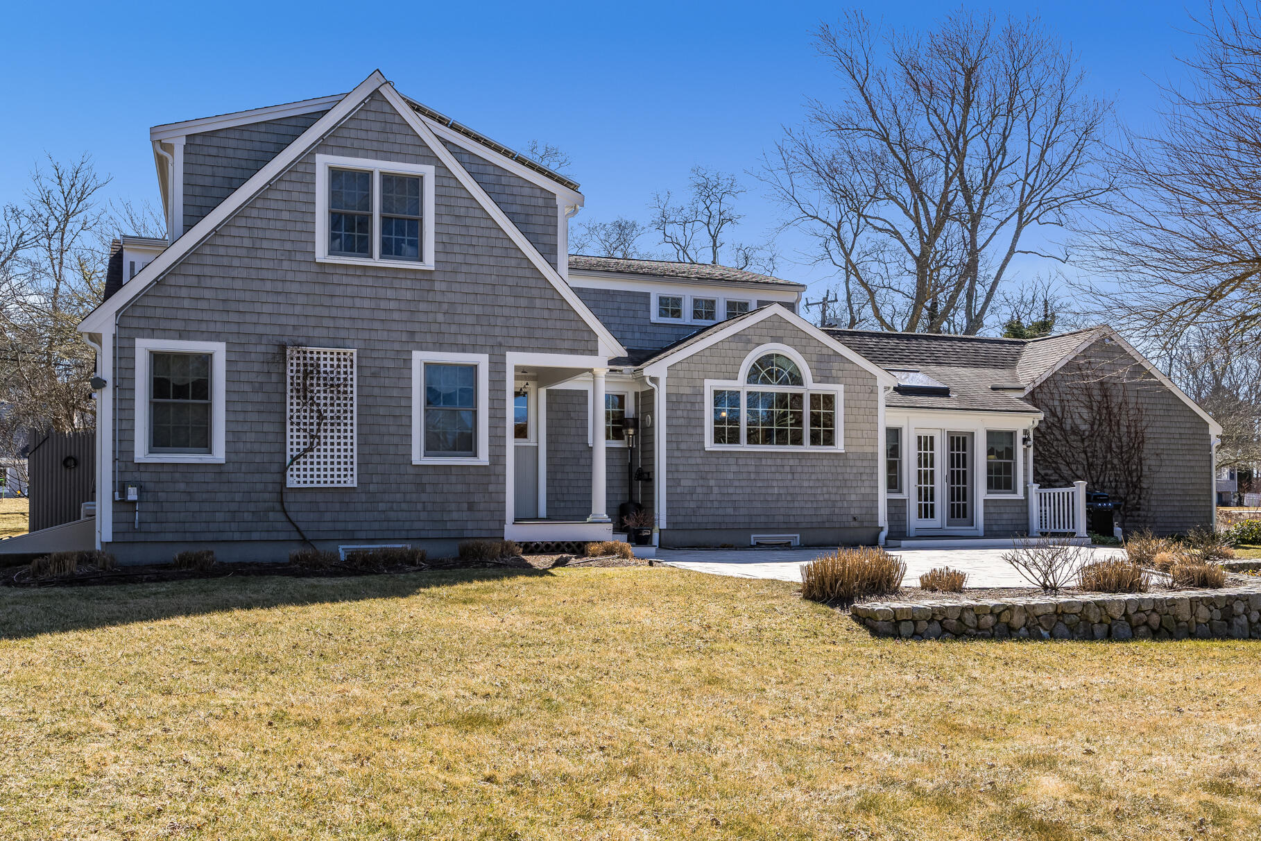 30 Beach Road Orleans, MA 02653 - Photo 59 of 76 a front view of a house with a yard