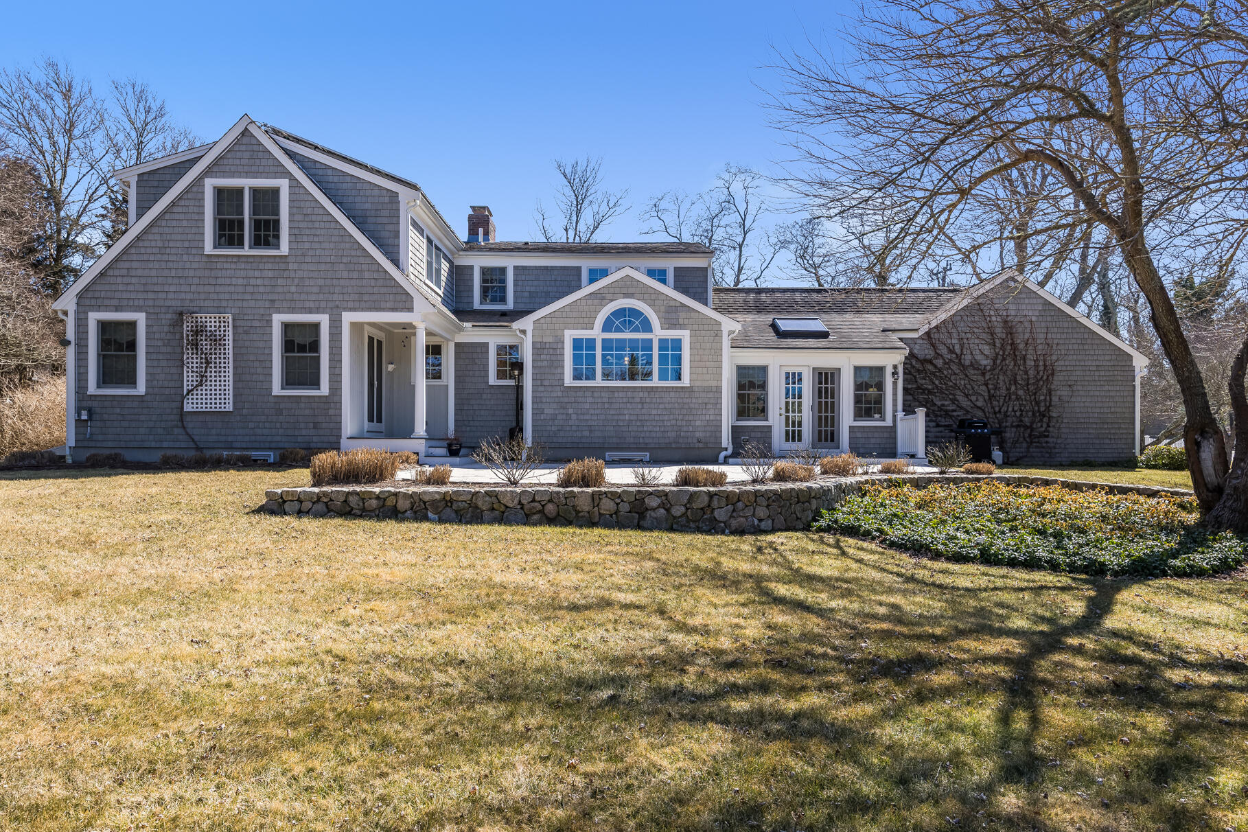 30 Beach Road Orleans, MA 02653 - Photo 60 of 76 a front view of a house with a yard