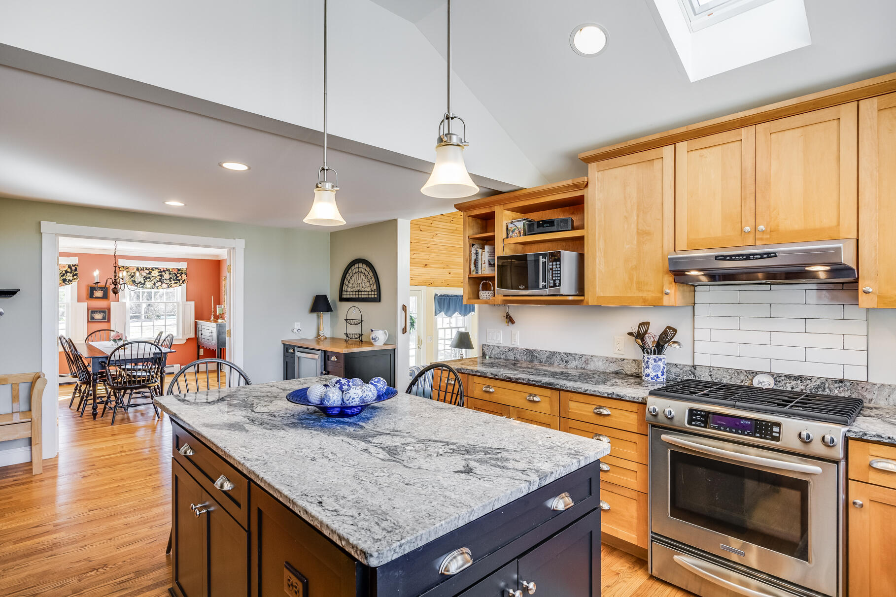 30 Beach Road Orleans, MA 02653 - Photo 10 of 76 a kitchen with stainless steel appliances granite countertop a stove a sink and a wooden cabinets