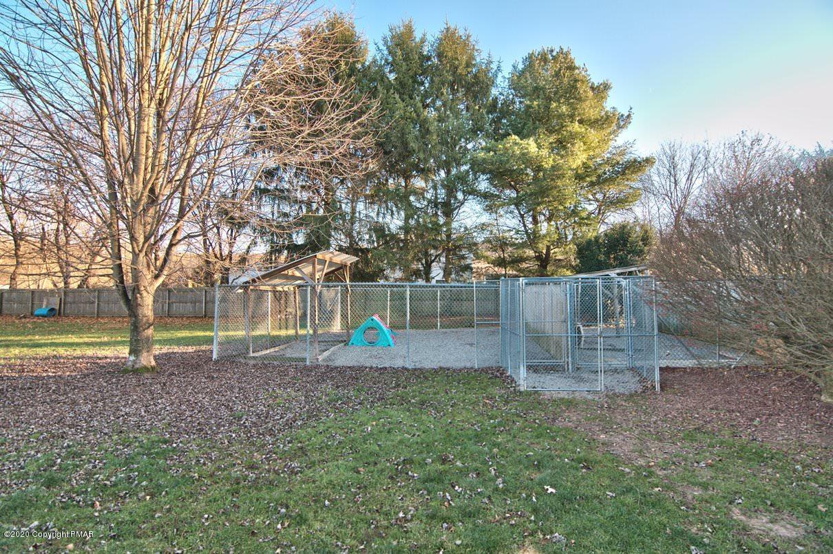 526 Weir Mountain Road Gilbert, PA 18331 - Photo 115 of 127 a backyard of a house with lots of green space