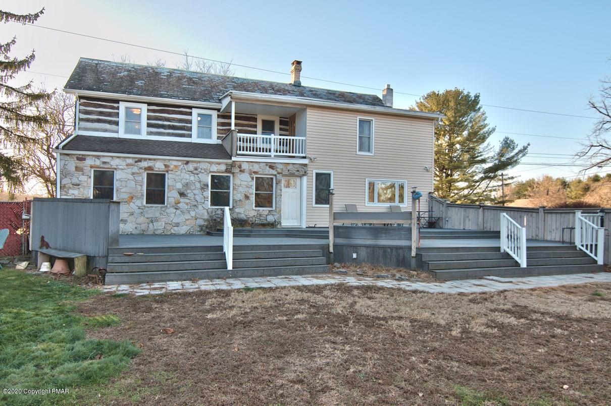 526 Weir Mountain Road Gilbert, PA 18331 - Photo 3 of 127 a view of a house with a yard