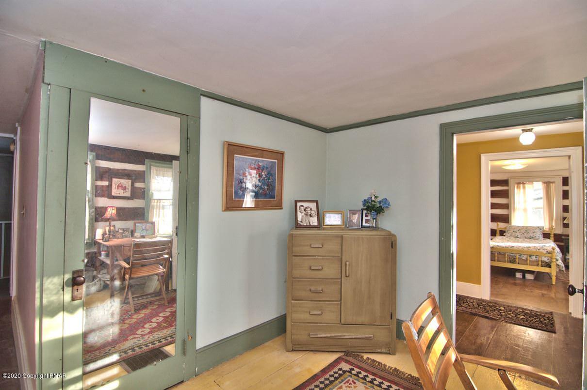 526 Weir Mountain Road Gilbert, PA 18331 - Photo 54 of 127 a view of room with window and furniture