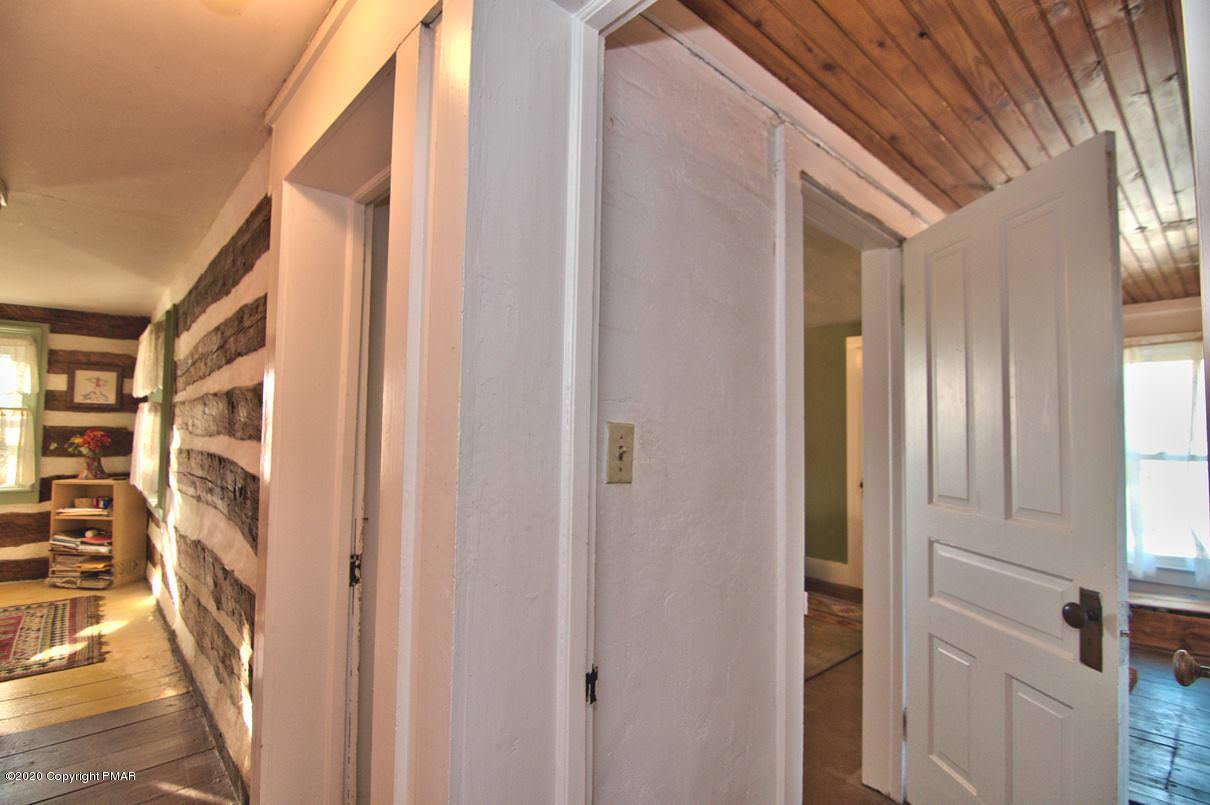 526 Weir Mountain Road Gilbert, PA 18331 - Photo 55 of 127 a view of front door with cabinets