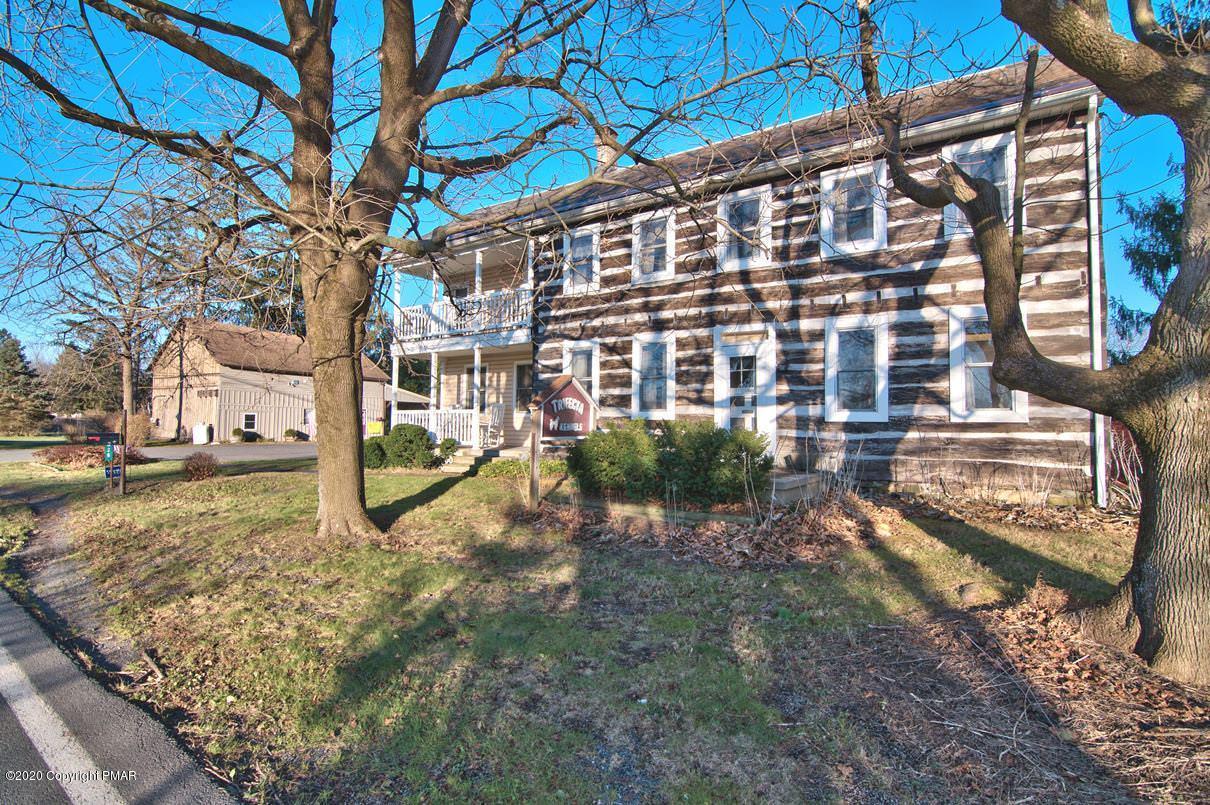 526 Weir Mountain Road Gilbert, PA 18331 - Photo 100 of 127 a view of a building with a yard