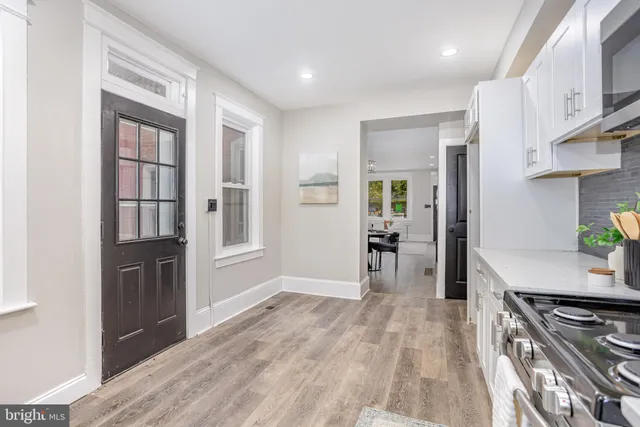 a bedroom with a large bed and window