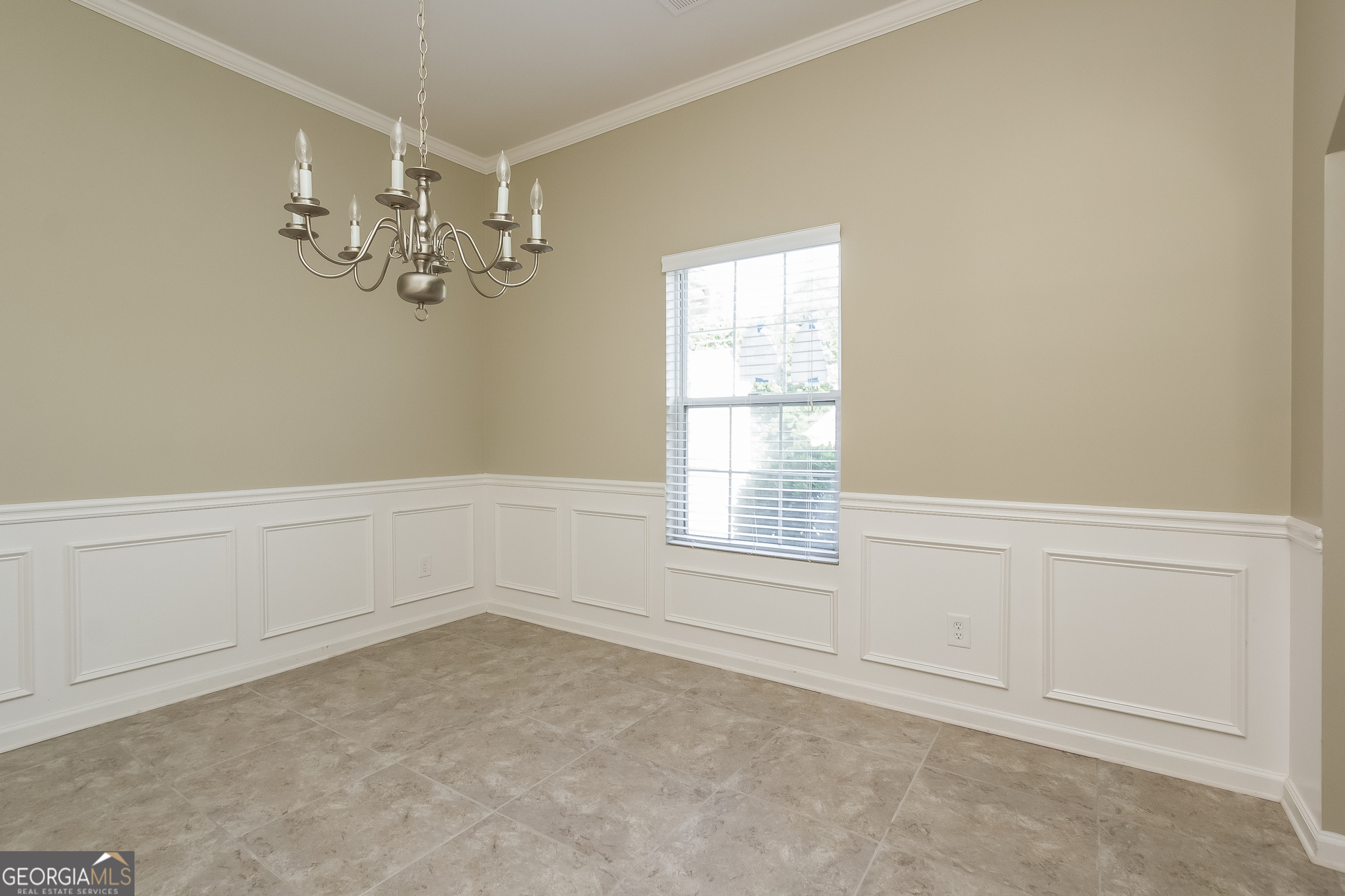 5892 Village Loop Fairburn, GA 30213 - Photo 3 of 15 an empty room with chandelier fan
