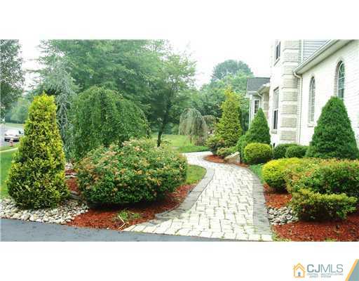 7 Gramercy Road Monmouth Junction, NJ 08852 - Photo 2 of 25 a black and white photo of a house