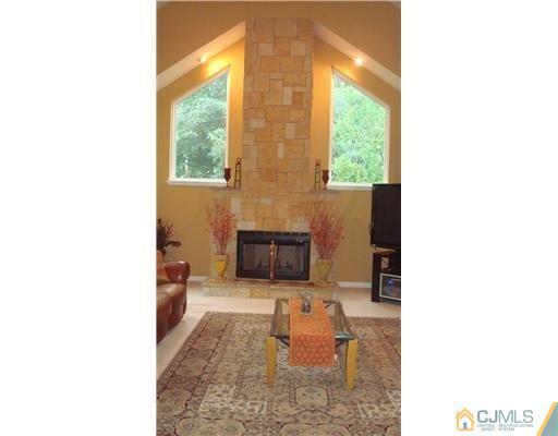 7 Gramercy Road Monmouth Junction, NJ 08852 - Photo 15 of 25 a living room with a window and a couch