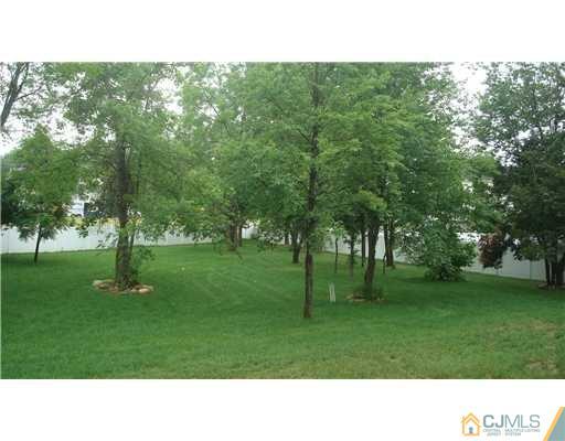 7 Gramercy Road Monmouth Junction, NJ 08852 - Photo 23 of 25 a open area with trees in the background