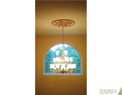 7 Gramercy Road Monmouth Junction, NJ 08852 - Photo 6 of 25 a view of a hallway with windows