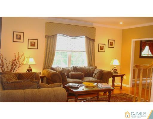 7 Gramercy Road Monmouth Junction, NJ 08852 - Photo 8 of 25 a living room with furniture and a window