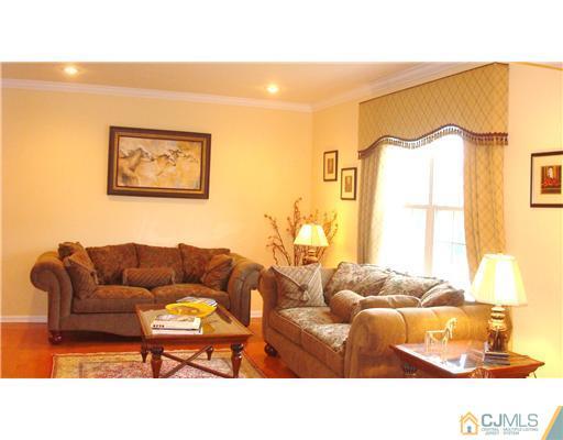 7 Gramercy Road Monmouth Junction, NJ 08852 - Photo 9 of 25 a living room with furniture and a window
