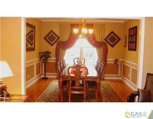 7 Gramercy Road Monmouth Junction, NJ 08852 - Photo 10 of 25 a black and white photo of a living room