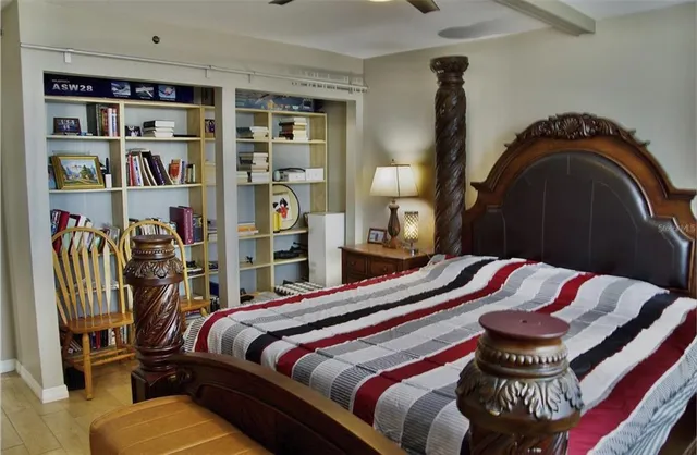 a bedroom with a bed and closet