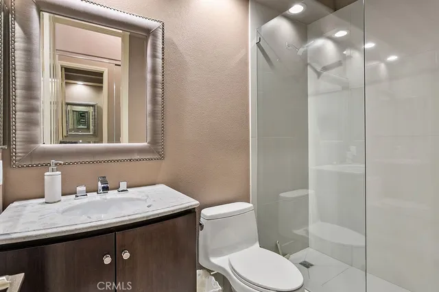 a bed room with a bed and a television