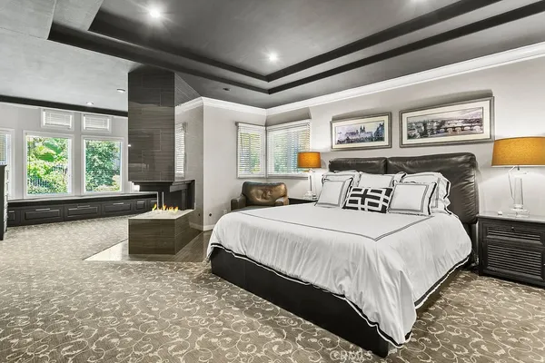 a spacious bathroom with a double vanity sink and a large mirror