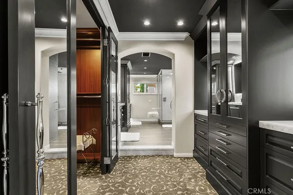 a bathroom with a sink a mirror and a bathtub