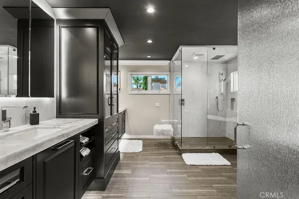 a living room with furniture a lamp on table and a window