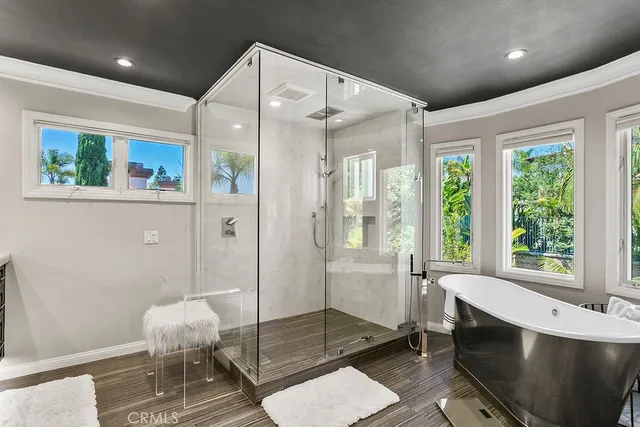 a view of a lake with couches and city view