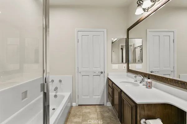 a kitchen with a sink and large window