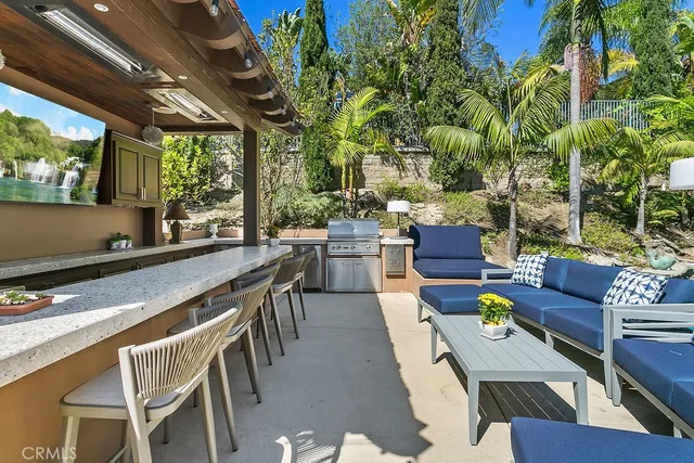 a view of a patio with swimming pool