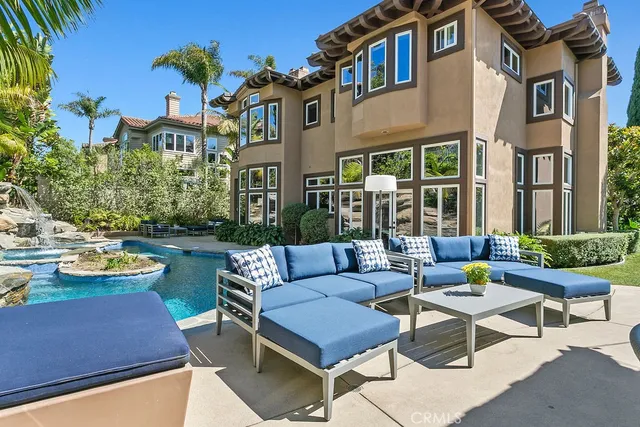 a view of a big yard with large trees