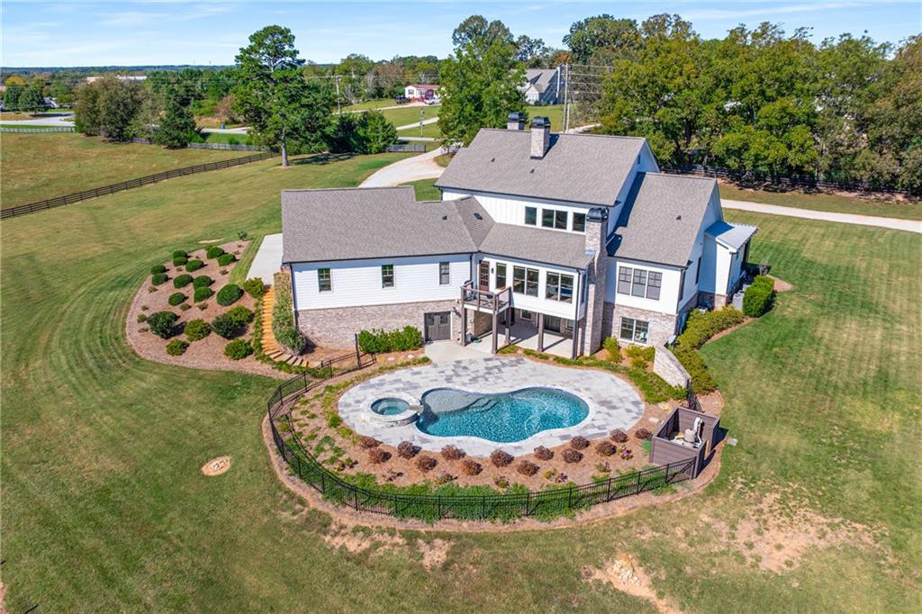 938 Austin Road Winder, GA 30680 - Photo 2 of 50 an aerial view of a house with outdoor space