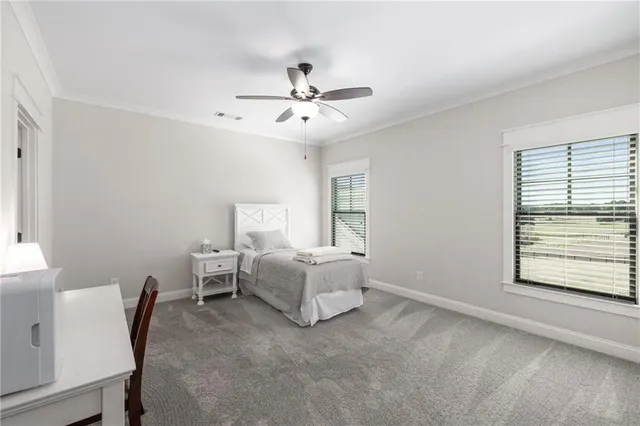 a dining room with furniture a fireplace and wooden floor