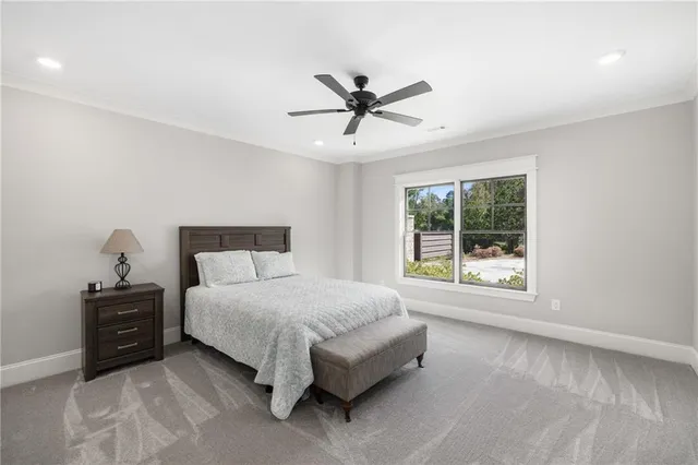 a view of a swimming pool with a yard